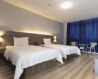 7Days Inn Luohe Forest Park Heshang Street Ancient Town - Luohe - Habitación