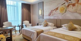 Vienna International Hotel (Nanning Huanan City) - Nanning - Bedroom