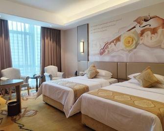 Vienna International Hotel (Nanning Huanan City) - Nanning - Bedroom