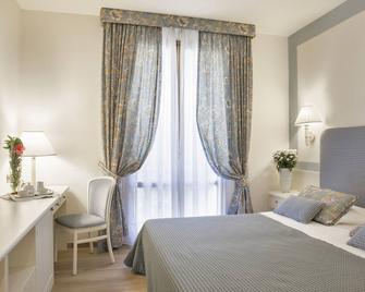 Relais Santa Chiara - Tuscany Charme - San Gimignano - Bedroom