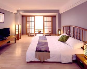 جراند·بالاس هوتل سورابايا - سورابايا - غرفة نوم