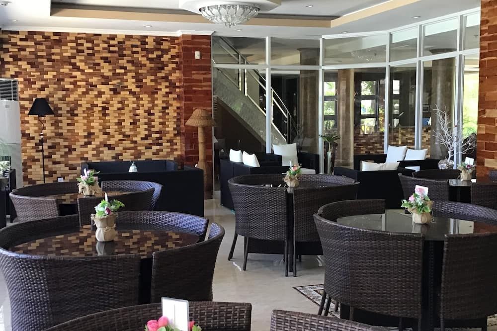 Em Royalle Hotel & Beach Resort - San Juan - Restaurante