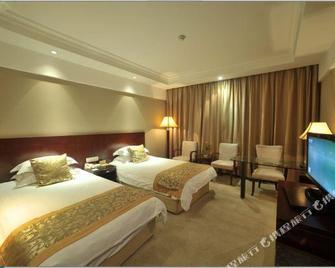 Taizhou Chunlan Hotel - Taizhou - Schlafzimmer