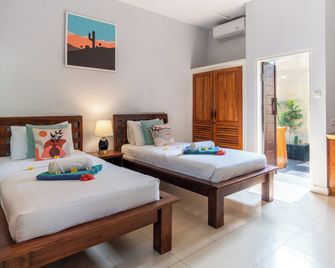 Bale Sampan Boutique Bungalows - Pemenang - חדר שינה