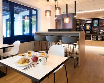B&B Hotel Schwerin-Süd - 什未林 - 餐廳