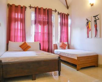Inroma Holiday Resort - Nuwara Eliya - Schlafzimmer