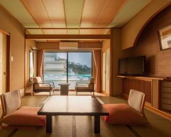 Smoking Ocean side Japanesestyle room 810 tatami mats Two meals included / Kamo-gun Shizuoka - Nishiizu - Comedor