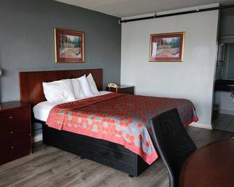 Starway Inn - Lansing - Bedroom