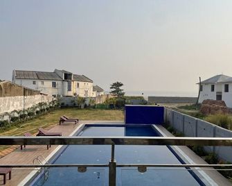 Tiger Inn Beach Resort - Mandarmani - Балкон