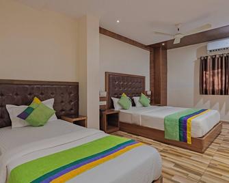 Treebo Seven Olives - Powai - Bedroom