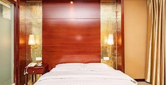Genius Hotel - Dazhou - Bedroom