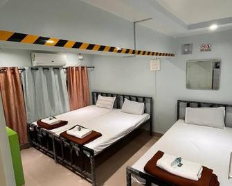 Mama Lodging & Boarding - Margao - Schlafzimmer