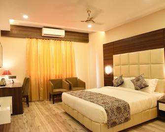 Moments - Lucknow - Habitación