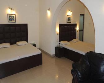 Ambica Residency - Cuttack - Bedroom