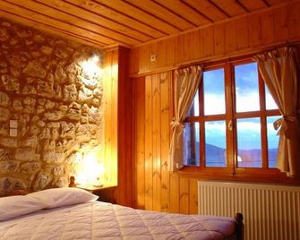 Ariadne Guesthouse - אראכובה - חדר שינה