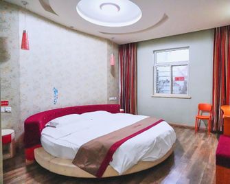 Huayi Select Hotel (Chengyang District Chongqing North Road, Qingdao) - Qingdao - Habitación