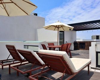 Bliss Villa 29 with two swimming pools, beach club and barbecue grill. - La Cruz de Huanacaxtle - Balcony