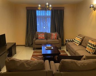 Milimani Serviced Apartments - Nakuru - Huiskamer