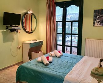 Dioscouroi Aparthotel - Agia Pelagia - Bedroom
