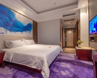 Nanning Qian Xi International Hotel - Nan-ning - Ložnice