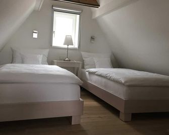 Apartment B OG (on 2 floors) - Christmann's Cottage Apartment An on the ground floor and - Weisenheim am Berg - Schlafzimmer