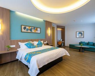 Baolong Homelike Hotel Shanghai - Ma An Shan Branch - Ma'anshan - Slaapkamer