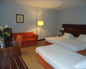 Hotel Rl Anibal - Linares - Schlafzimmer