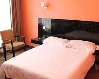 Motel 168 Huoshan - Shanghai - Bedroom