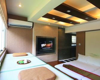 Host-On Exquisite Hotspring Hotel - Jiaoxi Township - חדר שינה