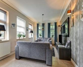 Cosy apartment near the beach - Sint Maartensbrug - Sala de estar