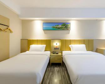 Jingtu Hotel Zhanjiang Dingsheng Plaza Store - Zhanjiang - Ložnice