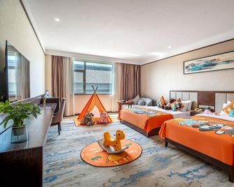 Grand Cloud View Hotel - Zibo - Schlafzimmer