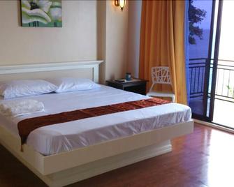 Cliff haven resort - Jagna - Habitación