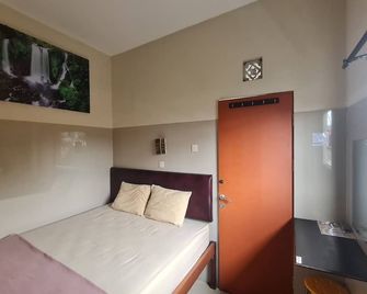 Capital O 93250 Hotel Tirta Kencana 2 Baturaden - Baturaden