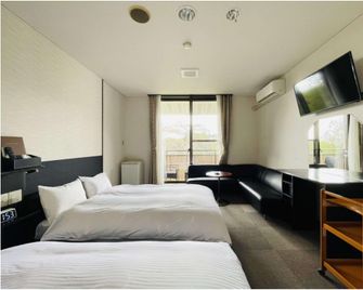 Adatara Onsen Hotel Paradise Hills - Nihonmatsu - Slaapkamer