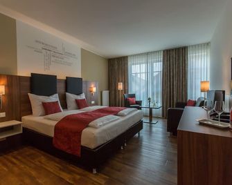Weingut Schreieck Vinotel & Gutshaus - Sankt Martin - Slaapkamer