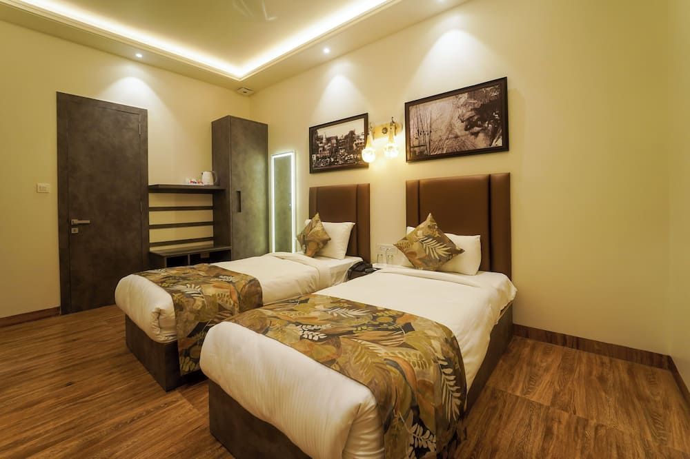 Sugar Stars Inn - ורנאסי - חדר שינה