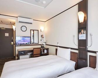 Toyoko Inn Okayama eki Higashi guchi - Okayama - Makuuhuone