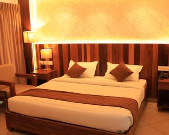 Lalys Residency - Rooms - Thrissur - Ložnice