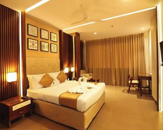 Magnet Hotel - Kannur - Bedroom