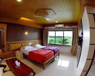 Hotel Sharada International - Udupi - Bedroom