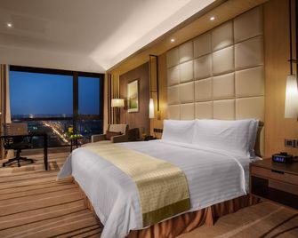 Holiday Inn Putian Xiuyu By IHG - Putian - Bedroom