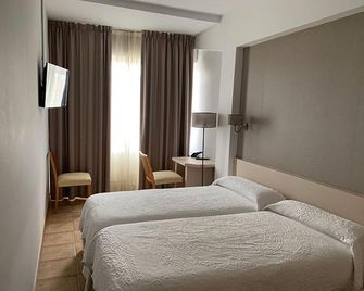 Hotel Brial - א קורונה - חדר שינה