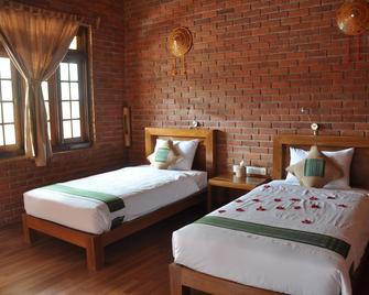 Trinity Family Inn - Nyaungshwe - Habitación