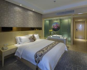 Paco Business Hotel Luogang Branch - Guangzhou - Bedroom