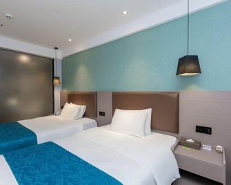 Impression Hotel (Ganzhou Nankang Furniture City Store) - Ganzhou - Habitación