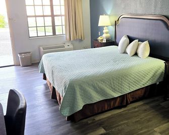 Best Price Motel & Suites - Orange - Slaapkamer
