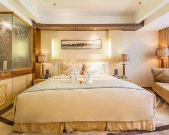 Jinze International Hotel - Yan’an - Спальня