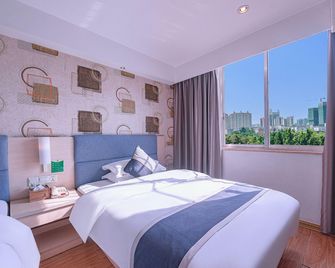 Jintone Hotel Yulin Central Bus Station Branch - Yulin - Habitación