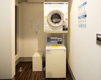 Hotel Tohko Hakata Gion - Munakata - Wäscheservice